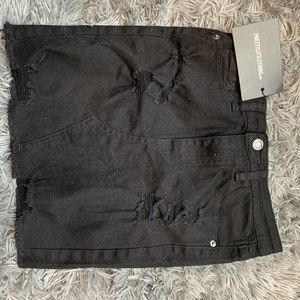 Pretty Little Thing Black Distressed Denim Skirt